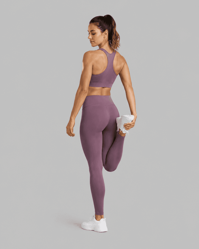 Athlete stretching in training gear — Women category